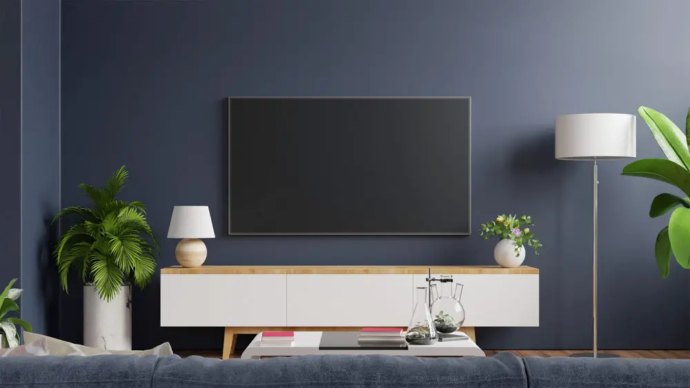 60-inch-tv-on-wall-with-navy-blue-wall