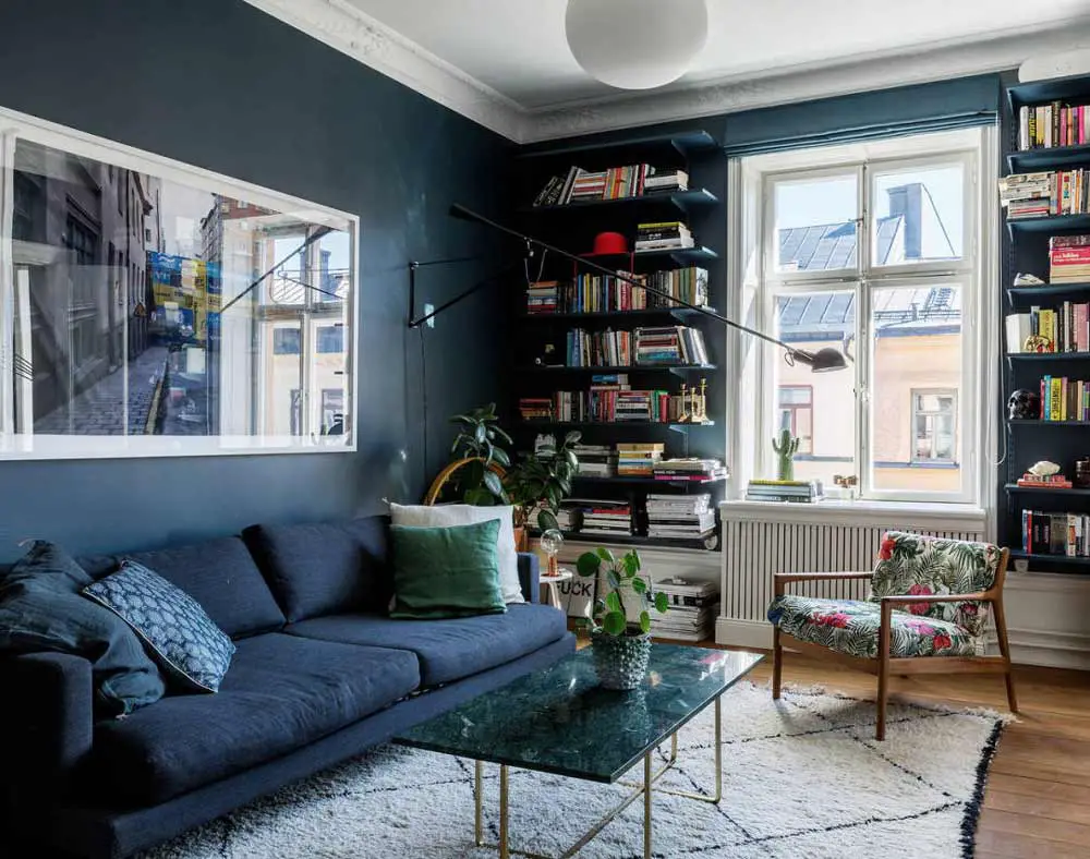 blend-the-navy-sofa-into-the-walls
