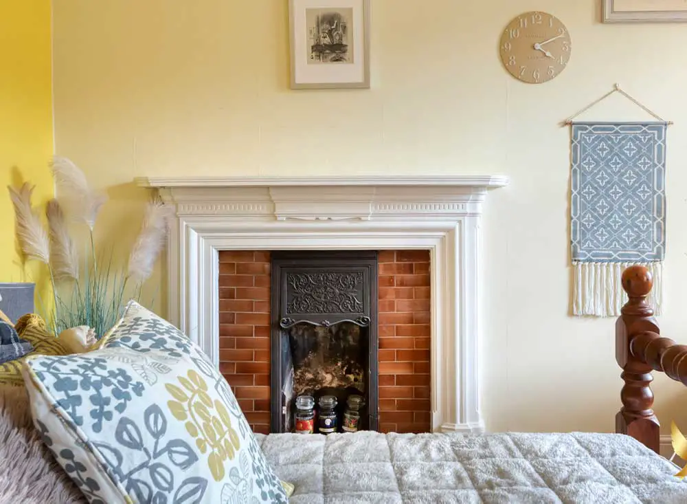 country-cottage-bedroom-with-fireplace