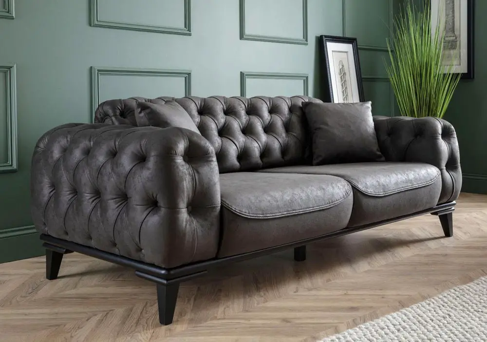 dark-grey-leather-sofa-with-green-panelled-wall