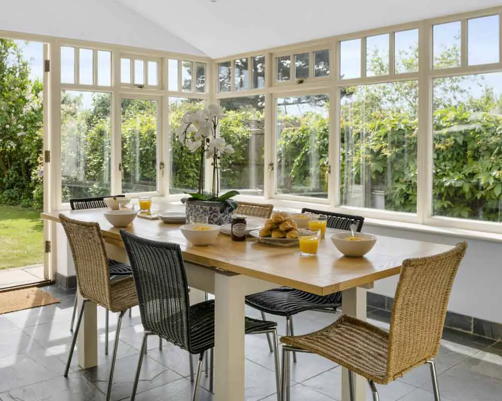 dining-table-and-chairs-in-conservatory