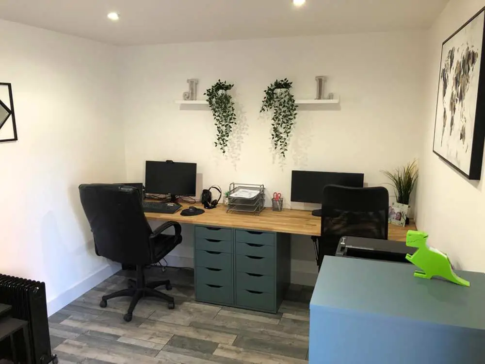 garage home office with plants and decor