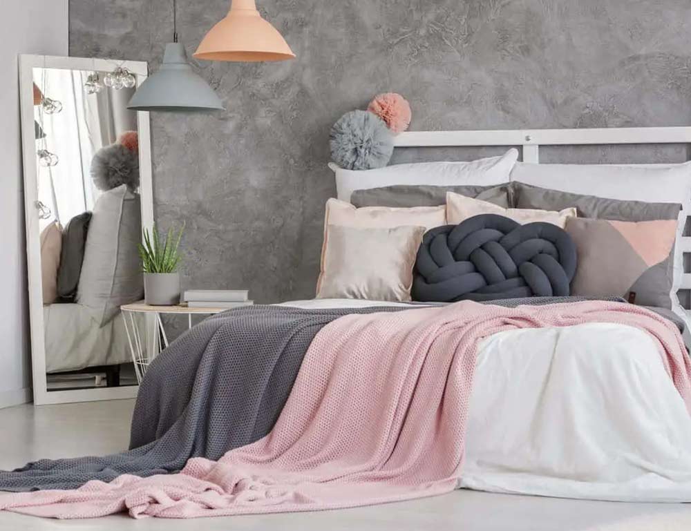 grey-and-pasel-coloured-bedroom