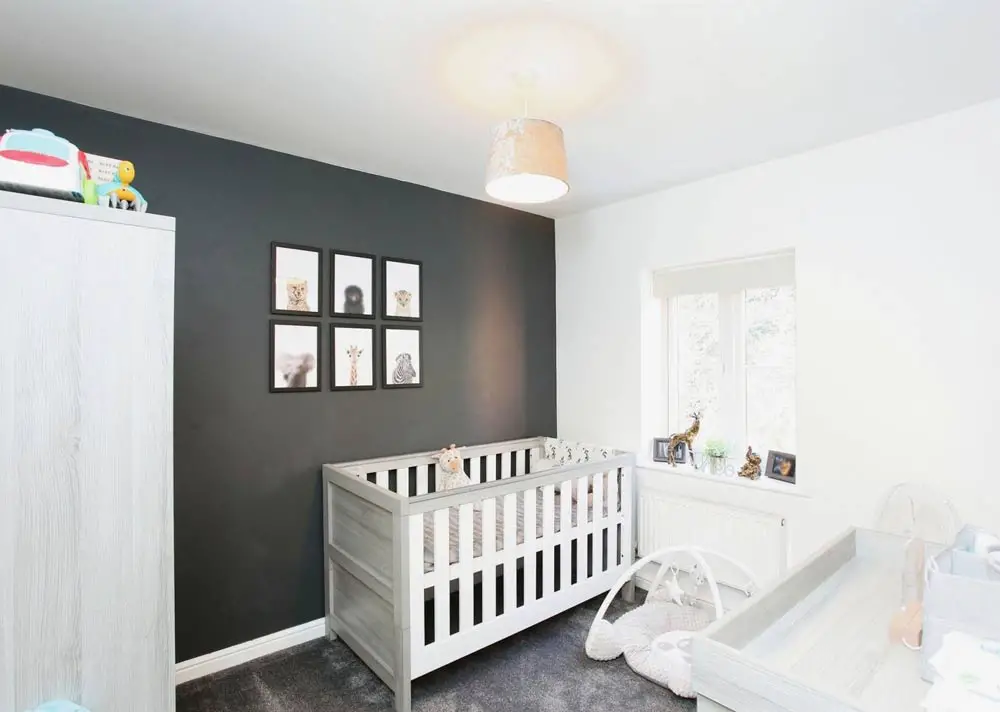 grey feature wall in nursery