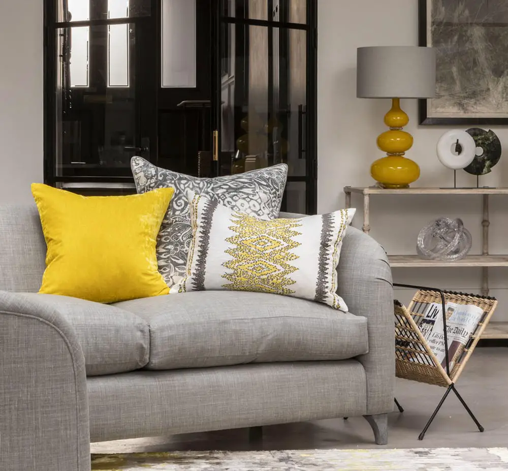 grey-sofa-with-gold-cushion