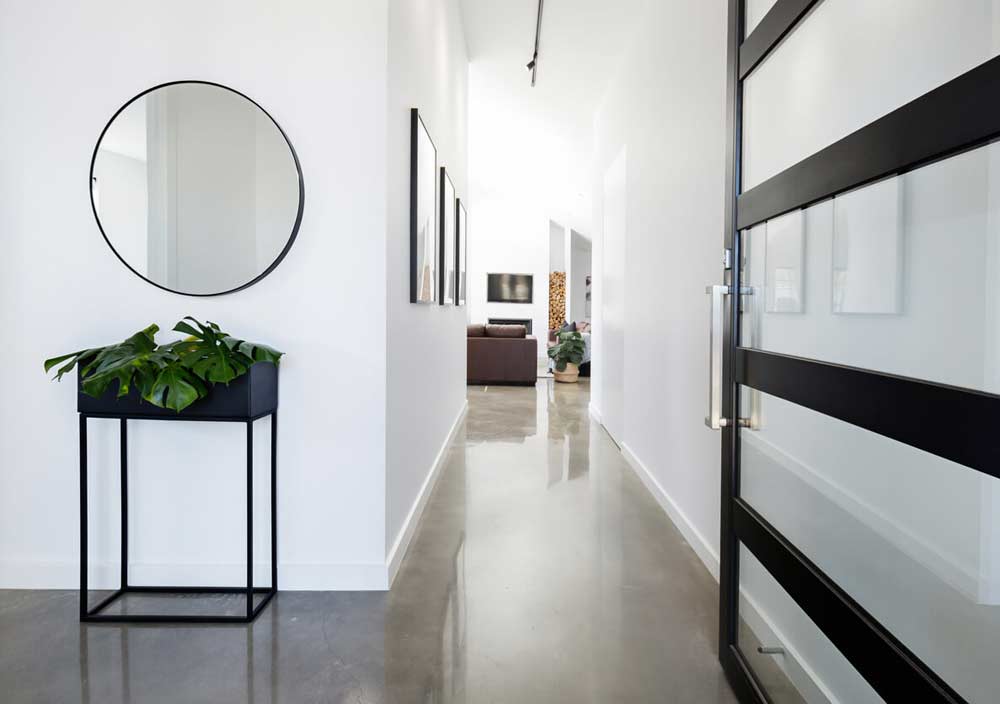hallway with reflective glass and mirror