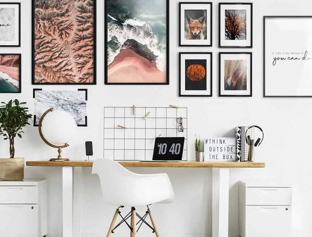 home office with wall art on the wall