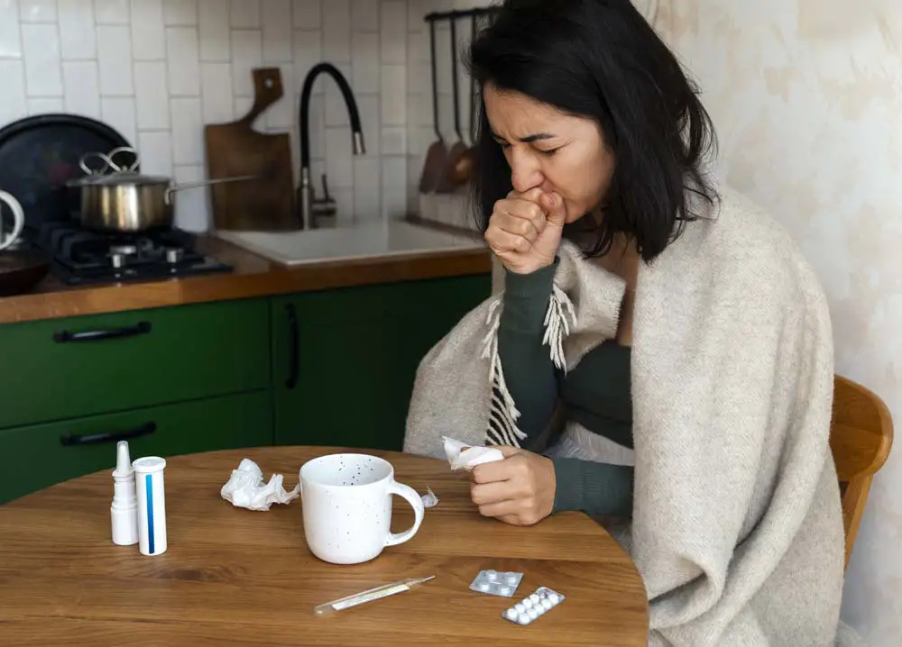 lady at table feeling ill