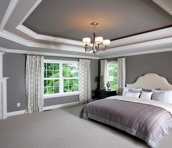 This modern luxury bedroom main feature is the bed, mixing a real lovely grey and silver bedspread complimented by the smart lamp across the way. 25 stunning grey and silver bedroom