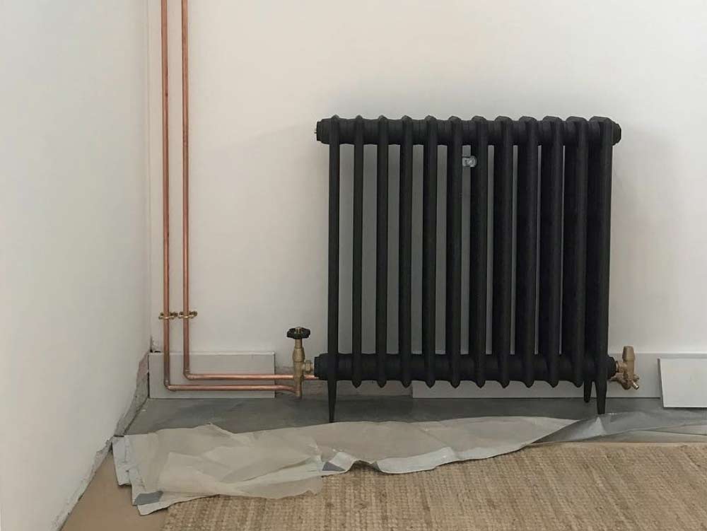 painting-or-covering-radiator-pipes