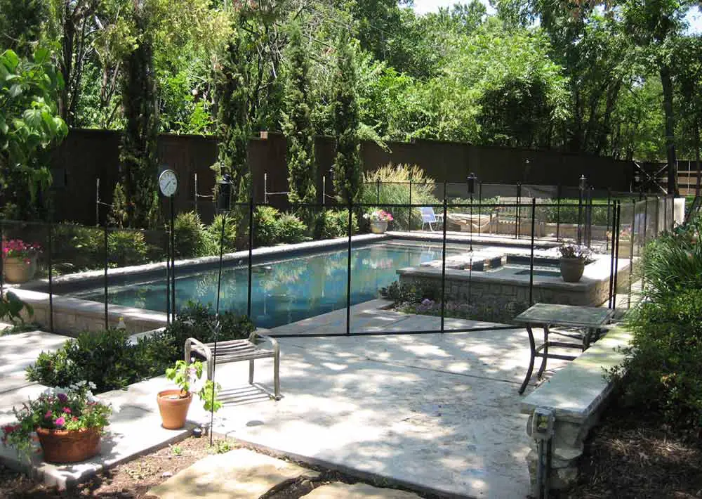Pool with mesh fence