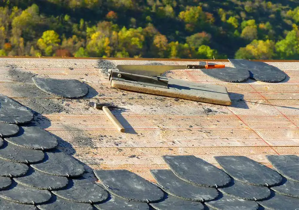 removal of roof tiles due to leaking roof