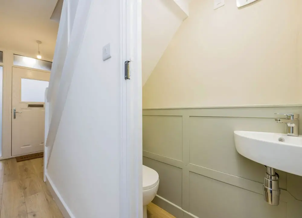 sage-panelled-understairs-toilet