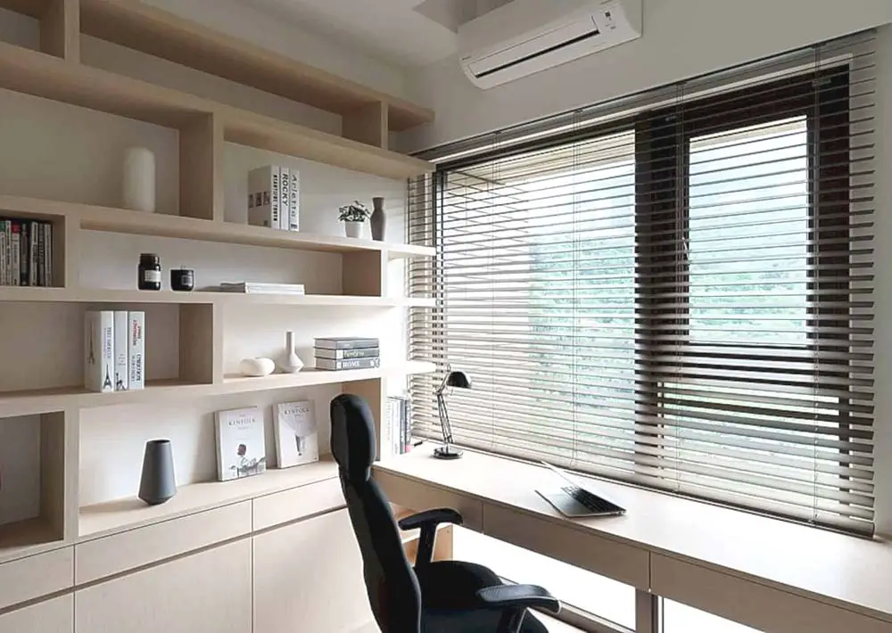 small home office natural light wall shelving