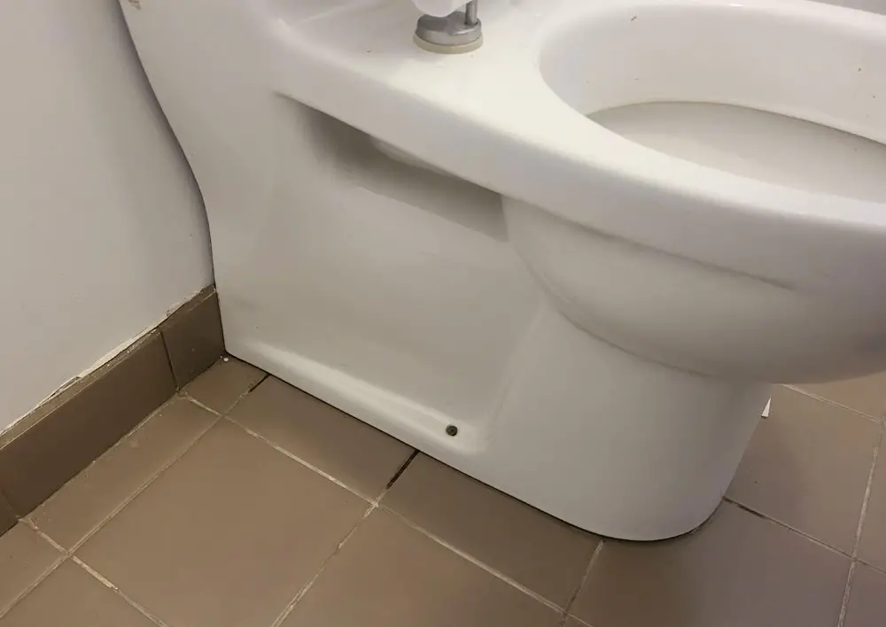 toilet leaking from base