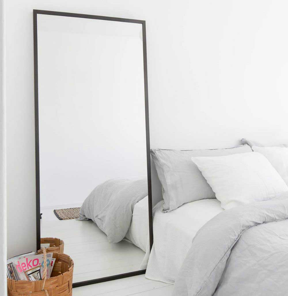 white-grey-bedroom-with-mirror