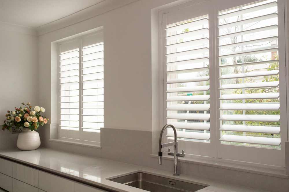 white-kitchen-window-shutters