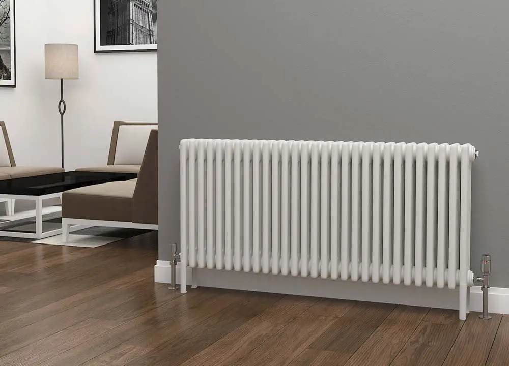 white-radiator-on-grey-wall