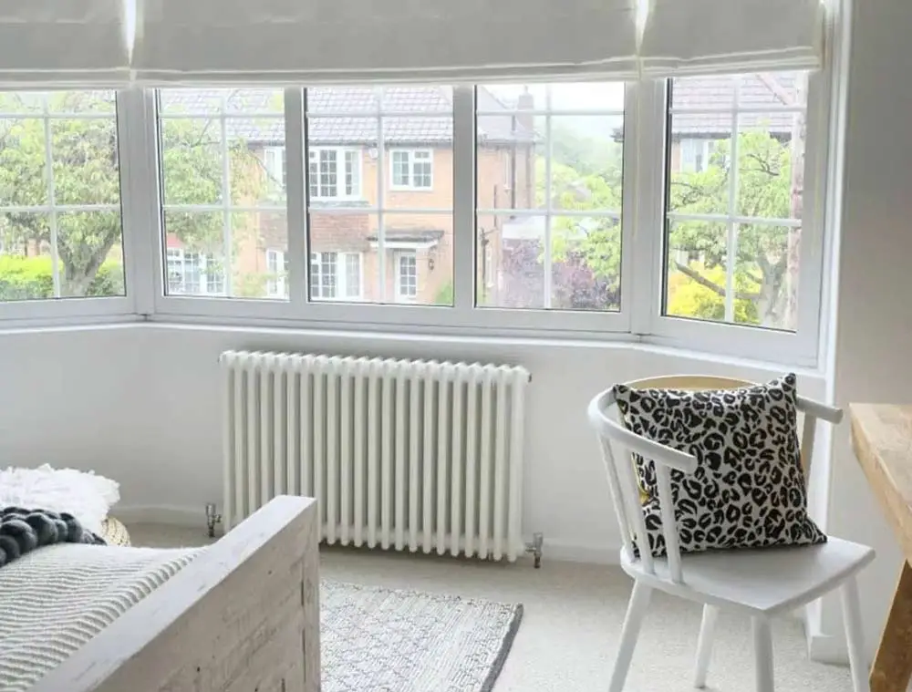 white-victorian-radiator-under-bedroom-window